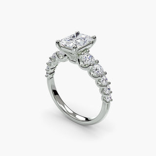 Graduated round U-prong diamond engagement band setting in white gold, featuring multiple sparkling diamonds from four angles.