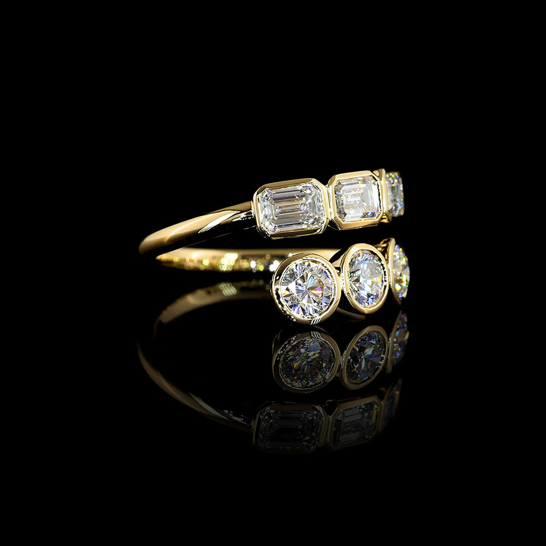 Emerald and Round Bezel Lab Grown Diamond Bypass Ring