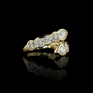 Gold Lab Grown Diamond bypass ring with pear and round bezel-set diamonds, 2.75ct total weight, featuring a mixed design.