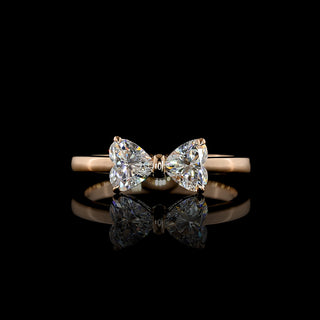 Heart-shaped bow lab-grown diamond ring featuring 0.85 carats, crafted with two settings, size 6.