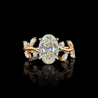 Oval lab-grown diamond engagement ring with marquise vine design in size 6.5, featuring 2.5 to 3 carats total weight.