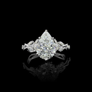 Elegant pear-shaped lab-grown diamond engagement ring with twisted vine design in white gold, featuring 2.75 to 3.25 carats total weight.