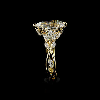 Lab-grown diamond engagement ring with twisted vine design, pear-shaped diamonds, 2.75 to 3.25 carats total, in yellow gold.