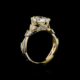 Pear-shaped lab-grown diamond engagement ring with twisted vine gold band and 2.75 to 3.25 carats total weight.