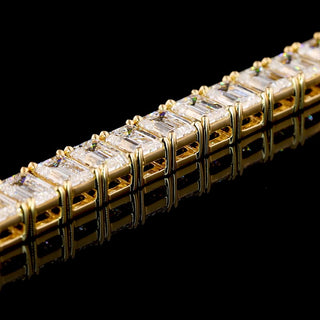 LabGrownDiamonds.com emerald lab-grown diamond tennis bracelet with 10 carats total weight, 7-inch yellow gold bracelet, sparkling stones.