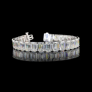 Emerald lab grown diamond tennis bracelet with 56 carats total weight, white gold, 7-inch length, featuring sparkling emerald-cut stones.