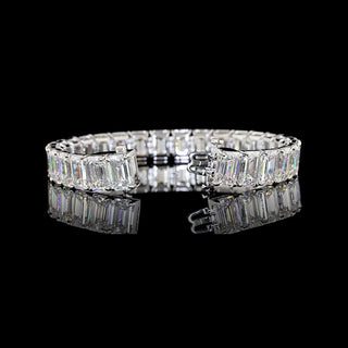 Emerald lab-grown diamond tennis bracelet with 56 carats total weight, 7-inch white gold bracelet featuring 200pt emerald cut diamonds.