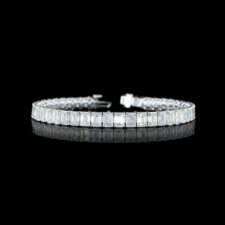 Emerald lab-grown diamond tennis bracelet with 20 carats total weight, 45 emerald-cut stones, 7-inch white gold band.