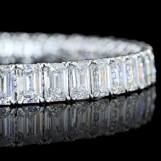 Lab Grown Diamonds 20 CTW emerald tennis bracelet with 45 emerald-cut lab-grown diamonds on a 7-inch white gold bracelet.
