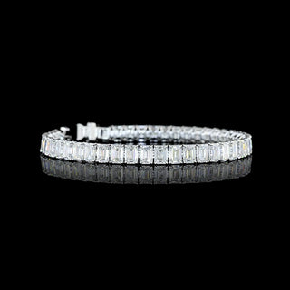 Emerald lab-grown diamond tennis bracelet with 20 carats total weight, 45 emerald diamonds, 7-inch white gold band.