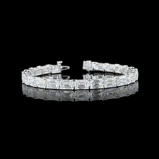 East-West emerald lab-grown diamond tennis bracelet in white gold with 24.55 carats total weight, 7-inch length.