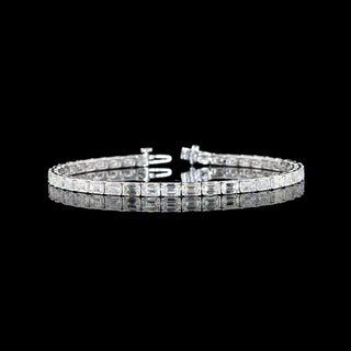 East-West emerald lab-grown diamond tennis bracelet with 8 carats total weight, set in white gold, 7-inch length.