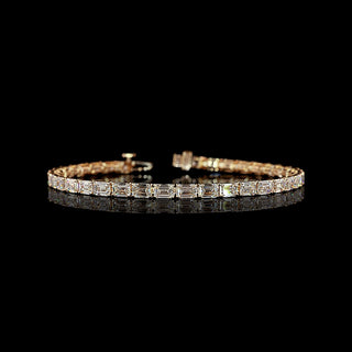 East-West Emerald-cut lab grown diamond tennis bracelet in 14k rose gold, prong setting, 10 carats total.