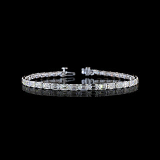 East-West Emerald-cut lab grown diamond tennis bracelet in 14k white gold, prong setting, 10 carats total.