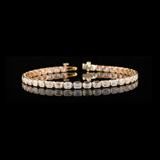 Lab Grown Diamonds 5 CTW emerald bezel tennis bracelet with east-west diamonds on a 7-inch rose gold chain.