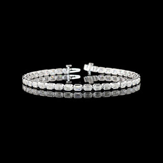 Lab-grown diamond tennis bracelet with emerald-cut stones, bezel setting, 5 carats total weight, 7-inch white gold bracelet.