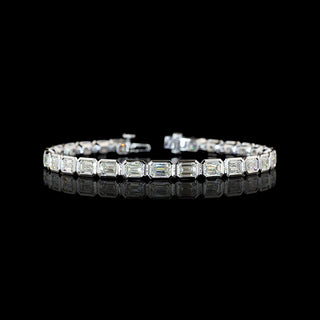 East-West Emerald-cut lab grown diamond tennis bracelet in 14k white gold, bezel setting, 10 carat total weight.