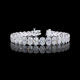 Oval lab-grown diamond tennis bracelet with 30 carats total weight, white gold setting, 7-inch length, showcasing sparkling gemstones.