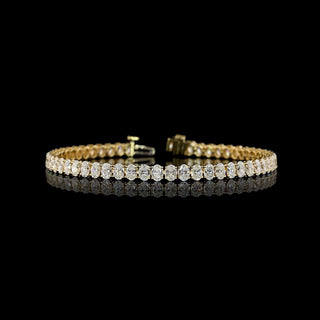Oval lab-grown diamond tennis bracelet with 8 carats total weight, 56 diamonds, 7-inch yellow gold setting, elegant jewelry piece