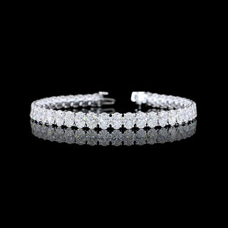 Oval lab-grown diamond tennis bracelet with 15 carats total weight, 42 diamonds, in white gold, 7-inch length.