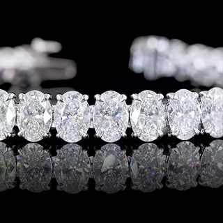 Oval lab-grown diamond tennis bracelet with 15 carats total weight, 42 diamonds, white gold, 7-inch length, elegant jewelry piece