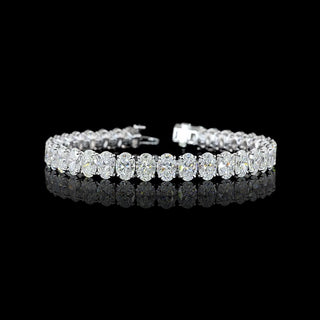 Oval lab grown diamond tennis bracelet in 14k white gold, prong setting, 25 carats total.