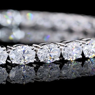 Oval lab-grown diamond tennis bracelet with east-west setting, 6 carats total weight, 7-inch white gold bracelet with 40 diamonds.