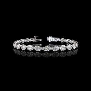 East-West Oval lab grown diamond tennis bracelet in 14k white gold, bezel setting, 10 carats total.