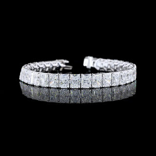 Radiant lab-grown diamond tennis bracelet with 34 carats total weight, white gold setting, and sparkling 10-point diamonds.