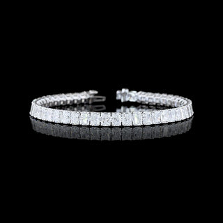 Radiant lab-grown diamond tennis bracelet with 15.6 carats total weight and 48 sparkling diamonds in white gold setting.