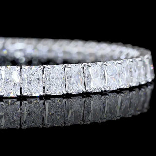 Radiant lab-grown diamond tennis bracelet with 15.6 carats total weight, 48 sparkling diamonds in white gold setting.