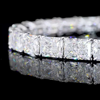 East-West radiant lab-grown diamond tennis bracelet with 23 carats total weight, 7.25 inches, featuring sparkling square-cut diamonds.