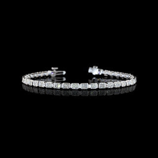 East-West Radiant lab grown diamond tennis bracelet in 14k white gold, bezel setting, 5 carats total.
