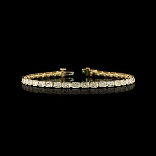 East-West Radiant lab grown diamond tennis bracelet in 14k yellow gold, bezel setting, 5 carats total.