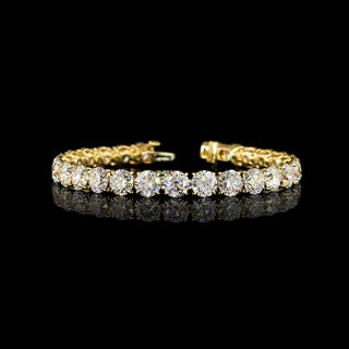 Yellow gold tennis bracelet with round lab-grown diamonds, 27 carats total weight, 7-inch length, 27 sparkling stones.