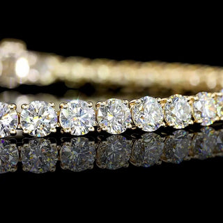 Gold 7-inch tennis bracelet with 45 round lab-grown diamonds totaling 9 carats, featuring 20pt stones from LabGrownDiamonds.com