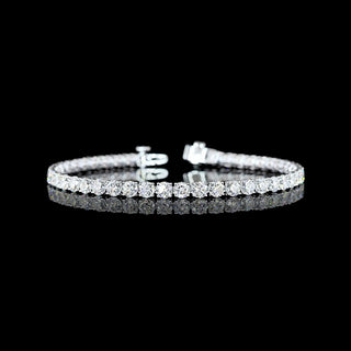 Round lab-grown diamond tennis bracelet with 9 carats total weight, 46 sparkling diamonds on a white gold setting.