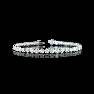 Round lab-grown diamond tennis bracelet with 10 carats total weight, 43 diamonds set in white gold on a 7-inch chain.