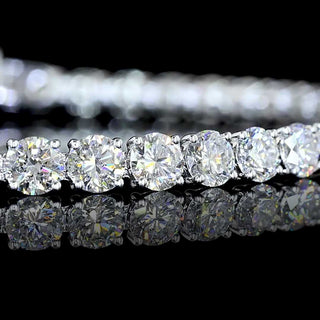 Round lab-grown diamond tennis bracelet with 10 carats total weight, 43 sparkling diamonds, 7-inch white gold bracelet.
