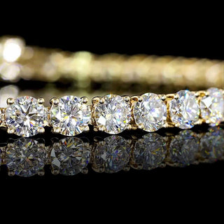 Round lab-grown diamond tennis bracelet with 10 carats total weight, 43 diamonds, 7-inch yellow gold setting, elegant jewelry piece