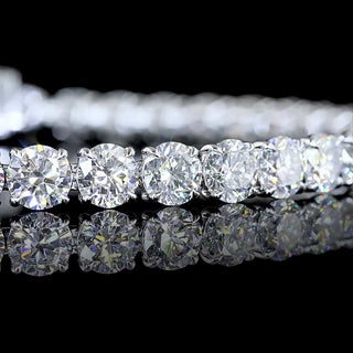 Round lab-grown diamond tennis bracelet with 12.5 carats total weight, 40 diamonds on a 7-inch white gold band.