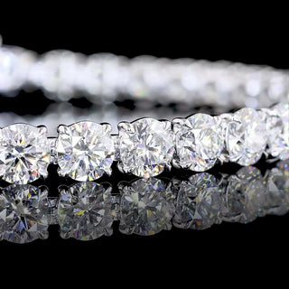 Round lab-grown diamond tennis bracelet with 15 carats total weight, 35 diamonds, in white gold, 7-inch length.