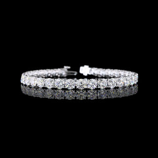 Round lab-grown diamond tennis bracelet with 19 carats total weight in white gold, featuring 60-point diamonds.