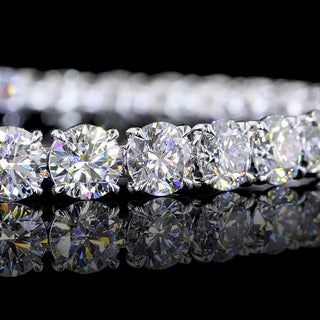 Round lab-grown diamond tennis bracelet with 19 carats total weight in white gold, featuring sparkling 60-point diamonds.