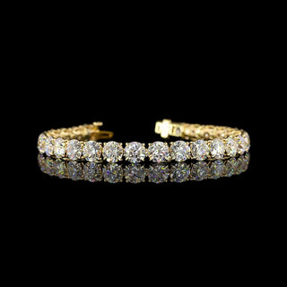 Round lab-grown diamond tennis bracelet with 21.75 carats total weight in yellow gold, 6.5 inches long.