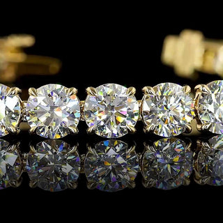 22 carat total weight round lab-grown diamond tennis bracelet in yellow gold, 6.5 inches long, featuring sparkling diamonds.