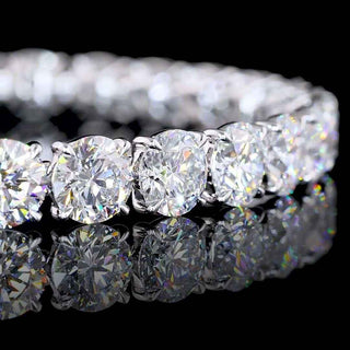 Round lab-grown diamond tennis bracelet with 22 carats total weight, set in white gold, 7-inch length, sparkling and elegant.