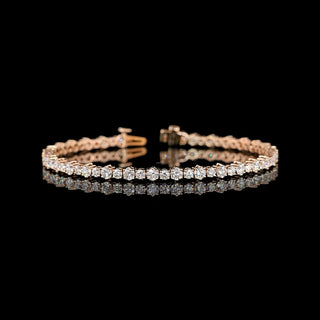 Alternating round lab-grown diamond tennis bracelet with 4.85 carats total, 7-inch length, showcasing sparkling diamonds on a sleek silver chain.