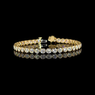 Lab Grown Diamonds 7 carat total weight round bezel tennis bracelet with yellow gold setting, featuring sparkling lab-grown diamonds.