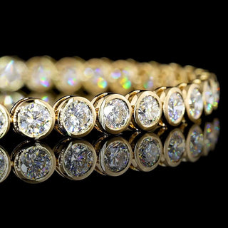 Lab Grown Diamonds 7 CTW round bezel tennis bracelet with yellow gold setting, showcasing sparkling lab-grown diamonds.